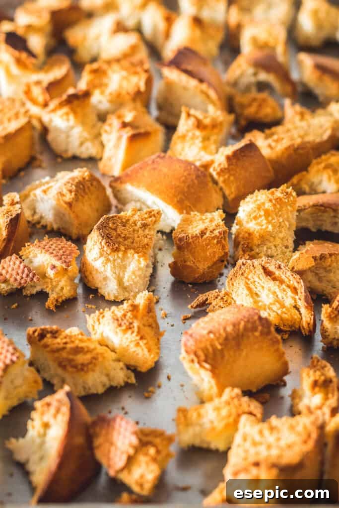 Savory Herb Stuffing Made Simple 4 Toasted cubed French bread on a sheet pan.