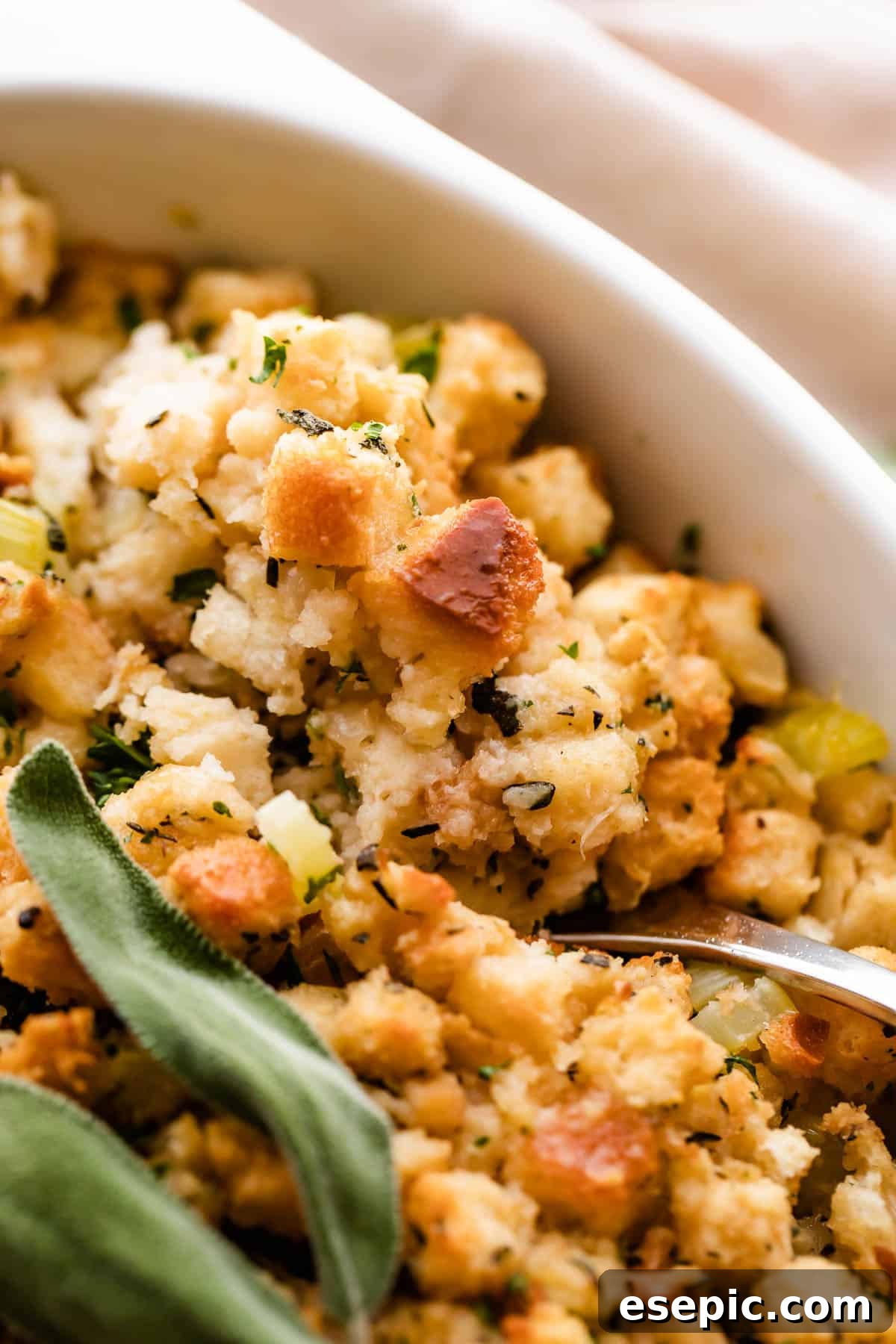 Savory Herb Stuffing Made Simple 8 A close-up shot of herb stuffing, showing the texture of the bread cubes.