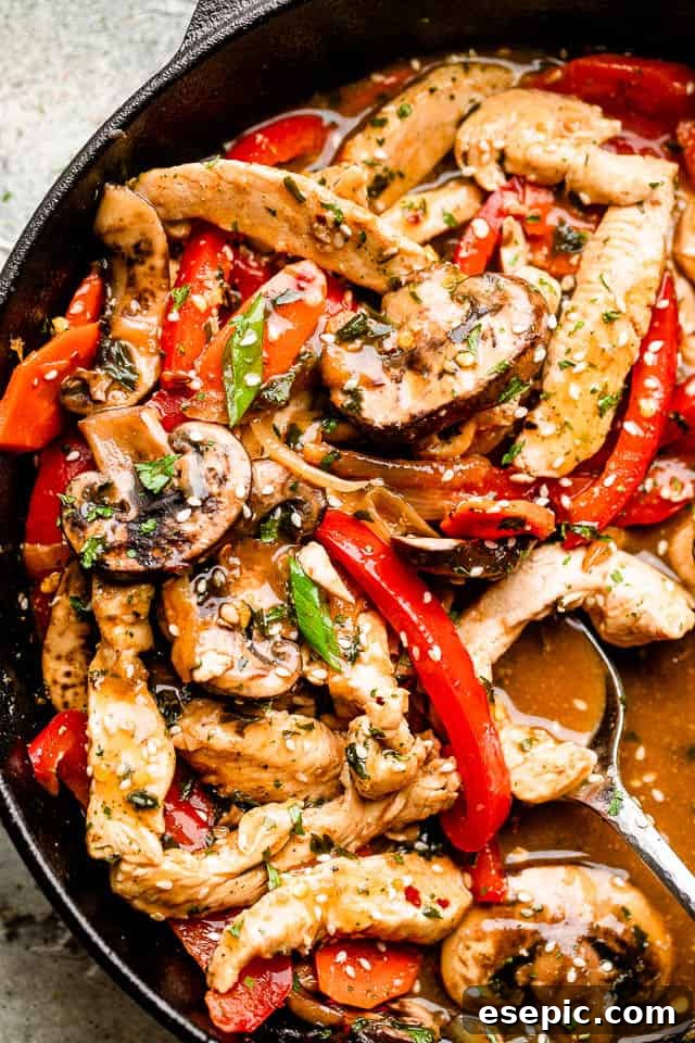 This better than takeout chicken stir fry recipe is packed full of fresh veggies and covered in a flavor-packed garlic and ginger sauce. Skillet with chicken stir fry