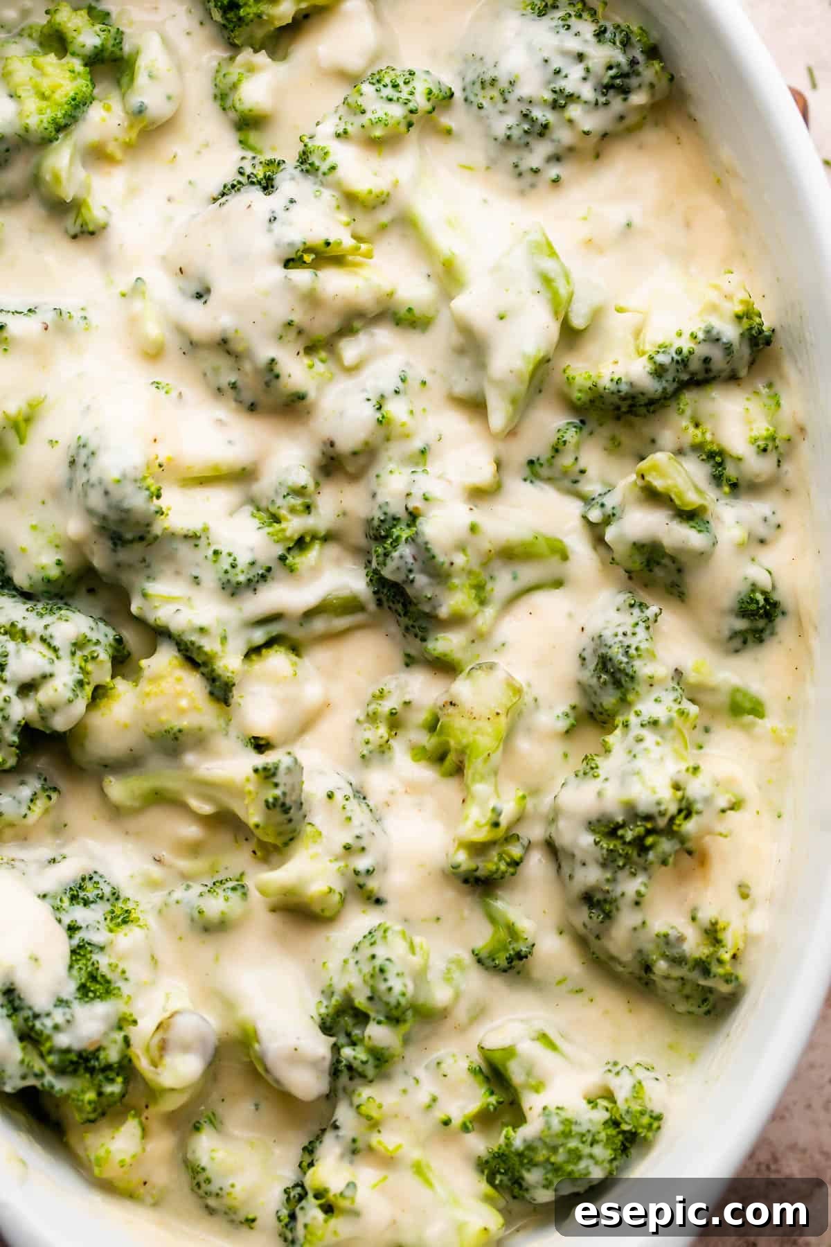 broccoli florets in a creamy cheese sauce.
