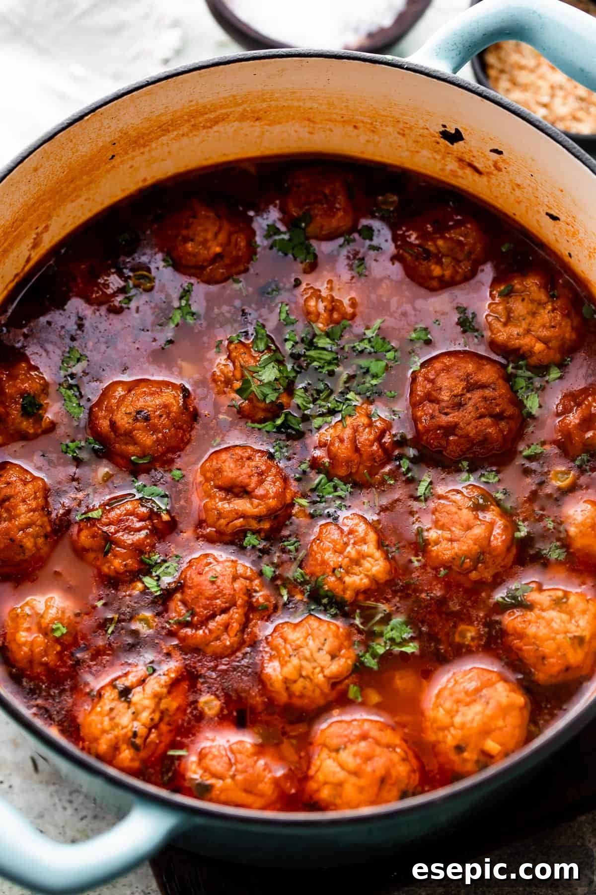 overhead shot of a dutch oven with Albondigas Soup.