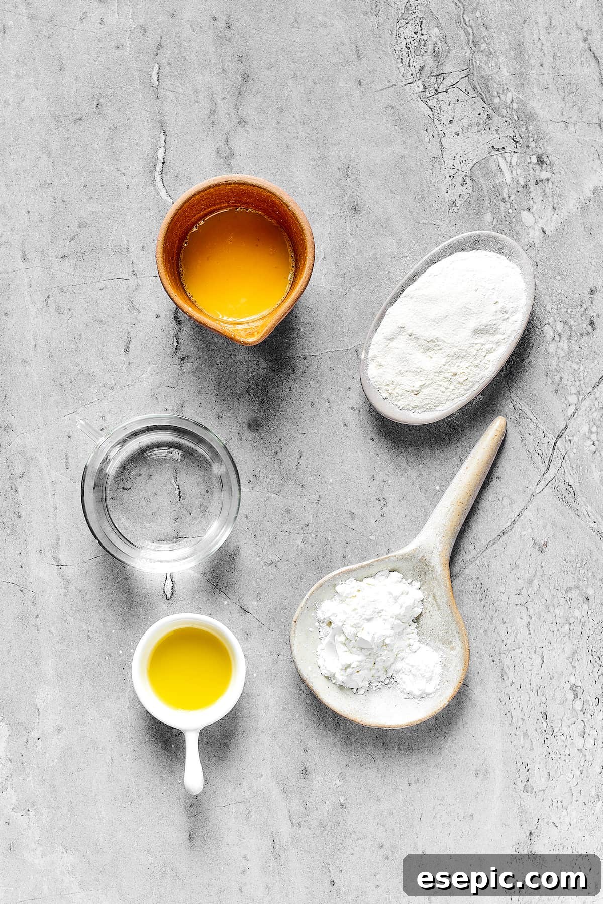 From top: Beaten egg, flour, cornstarch, olive oil, water.