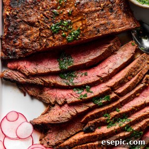 Juicy Grilled Carne Asada Perfection 6 Thinly sliced grilled carne asada on a serving platter.