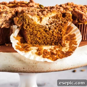 Pumpkin muffins arranged on a cake stand.