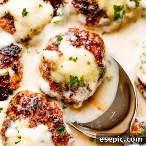 scooping out swedish meatballs drizzled with gravy