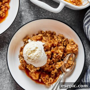 Ice-cream topped apple bake, with an oat topping.