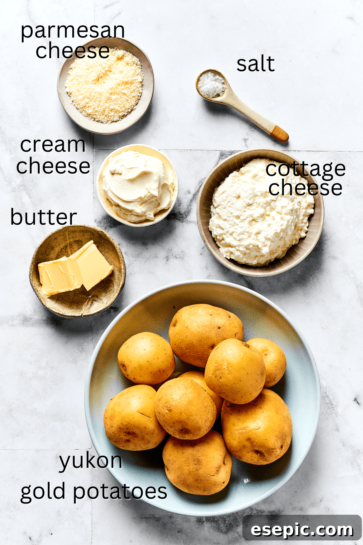 Fresh Ingredients for Rich Potato and Cheese Pierogi Filling Ingredients for a creamy potato and cheese pierogi filling: Yukon Gold potatoes, sea salt, unsalted butter, cottage cheese, cream cheese, and Parmesan cheese.
