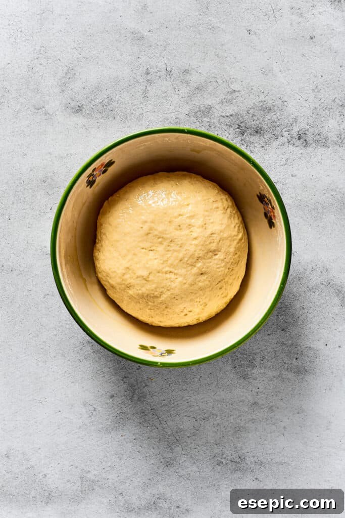 A small ball of dough in a mixing bowl.