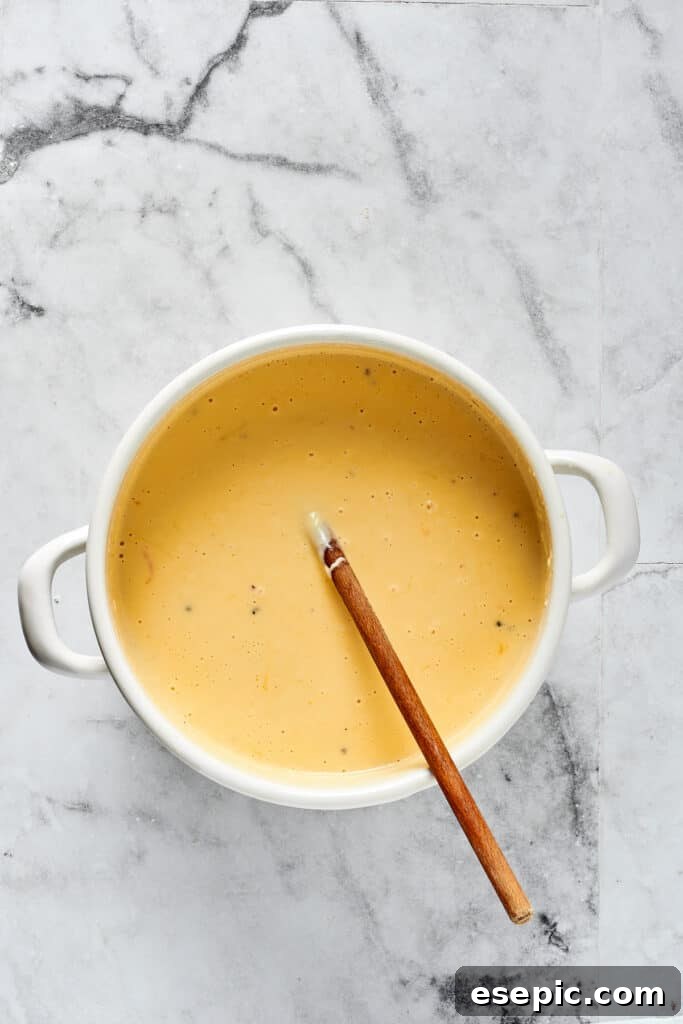 Cheese sauce in a Dutch oven.