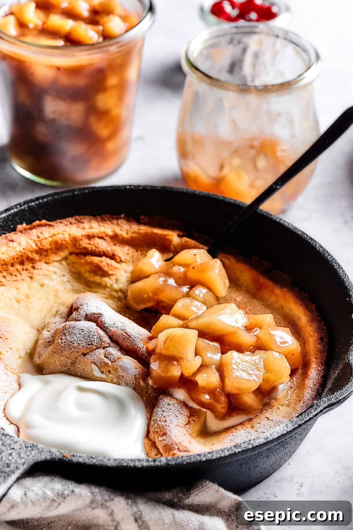 A German pancake with yogurt and apple filling.