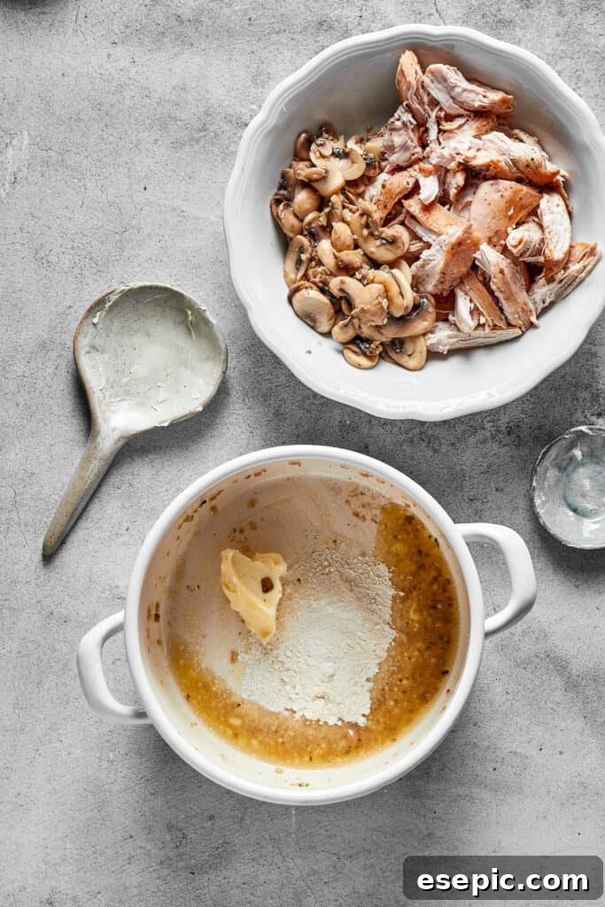 Butter melted in a pot, ready for flour to create the roux, the base of the creamy tetrazzini sauce.