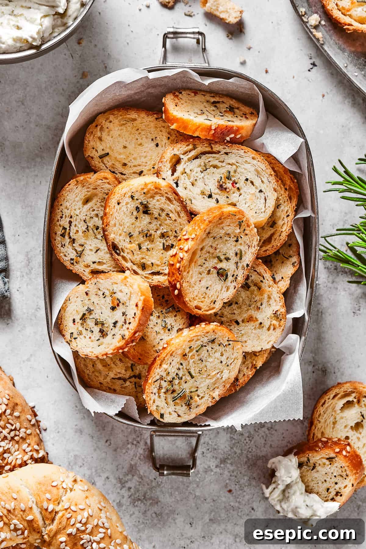 Homemade Bagel Chips: Buttery, crunchy, savory, and incredibly easy to make for a truly addictive snack experience! Overhead shot of homemade chips made from bagels.
