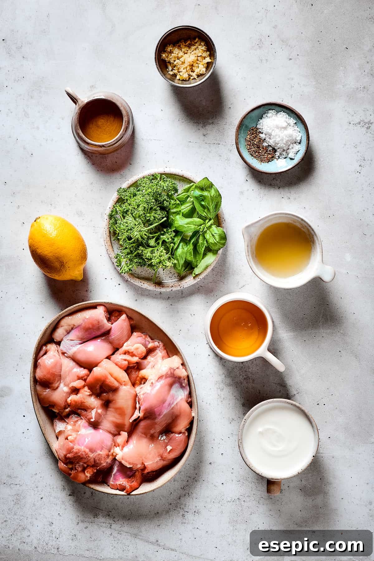 Yogurt Marinated Chicken is an easy grilled chicken recipe that’s versatile, zesty, and easy to make. Everyone will rave over this easy dish! From top: Garlic, salt and pepper, lemon juice, honey, yogurt, chicken thighs, herbs, olive oil.