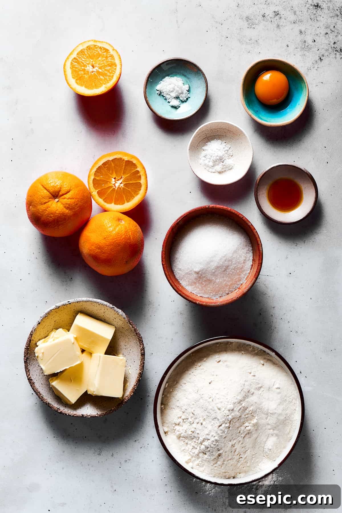 Sweet, buttery Orange Cookies have a light citrus taste and pretty pastel color - perfect for parties, cookie swaps, baby showers, and more! From top: Oranges, salt, orange zest, baking powder, vanilla, sugar, butter, flour.
