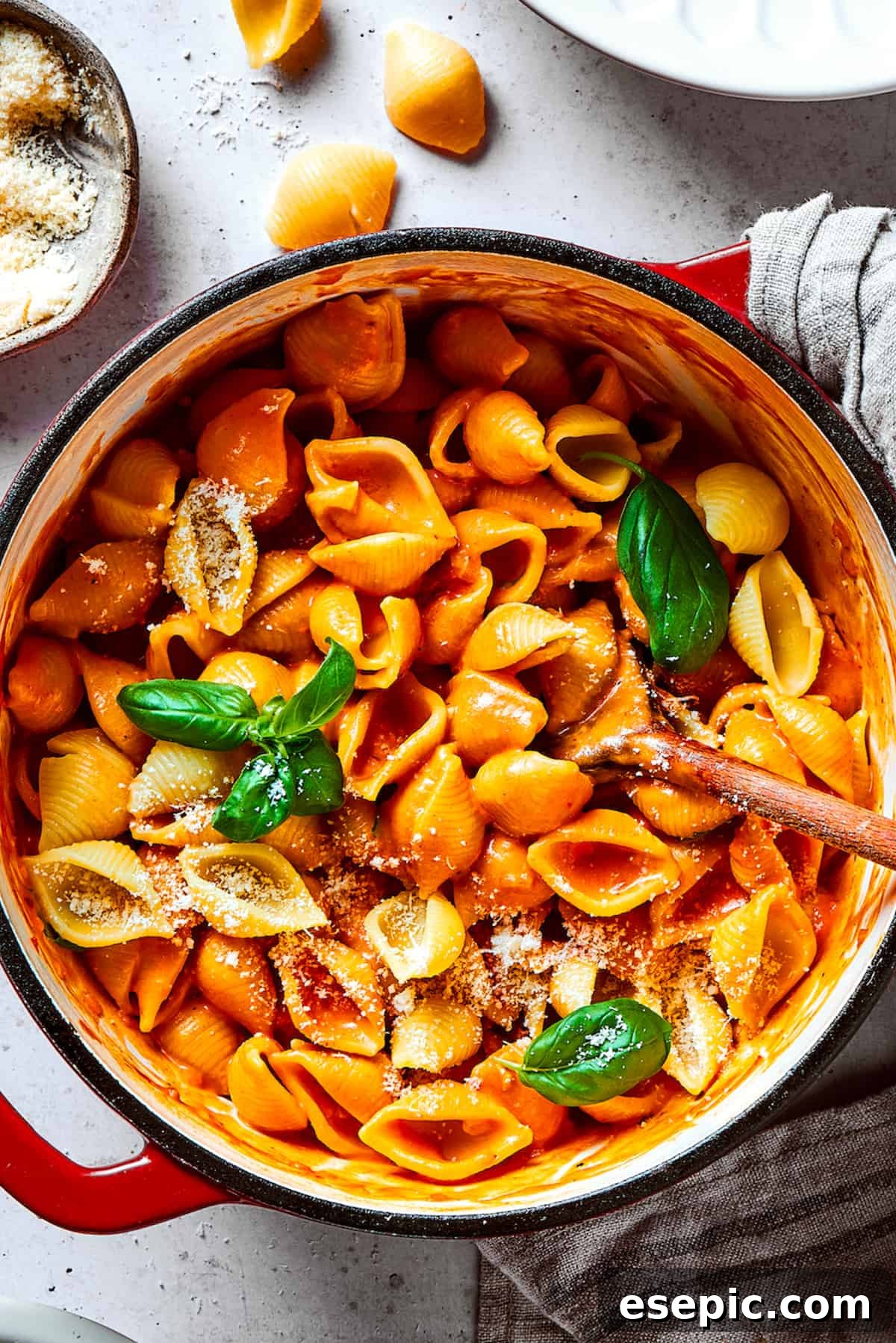 Gigi Hadid's Famous Pasta Two Ways 2 A pot of pasta shells coated in a rich, creamy tomato sauce.