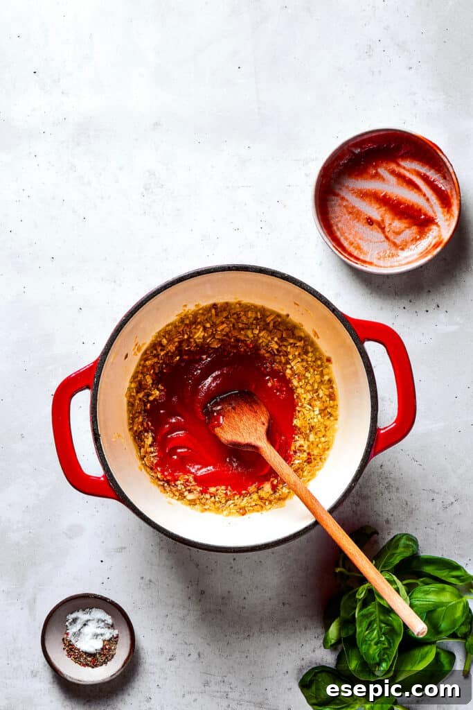 Gigi Hadid Pasta is an easy recipe that every busy cook should know! With tender pasta, red pepper flakes, and cream, it's total comfort food. Sauteing vibrant tomato paste with aromatics in a skillet.