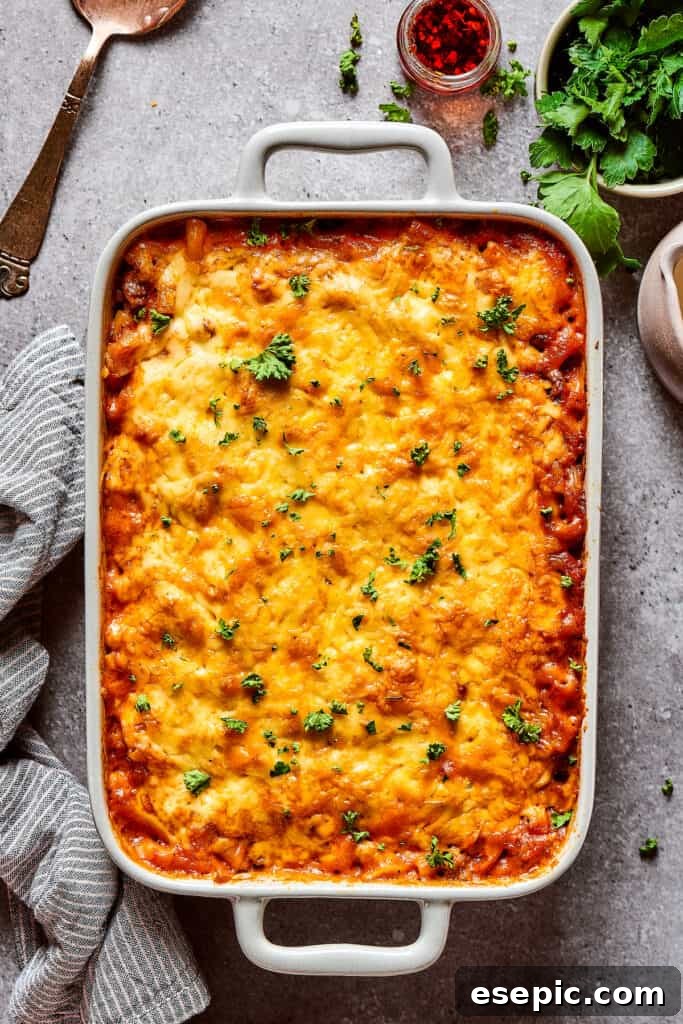 The golden-brown, bubbly baked cheeseburger casserole fresh from the oven, showing perfectly melted cheese.