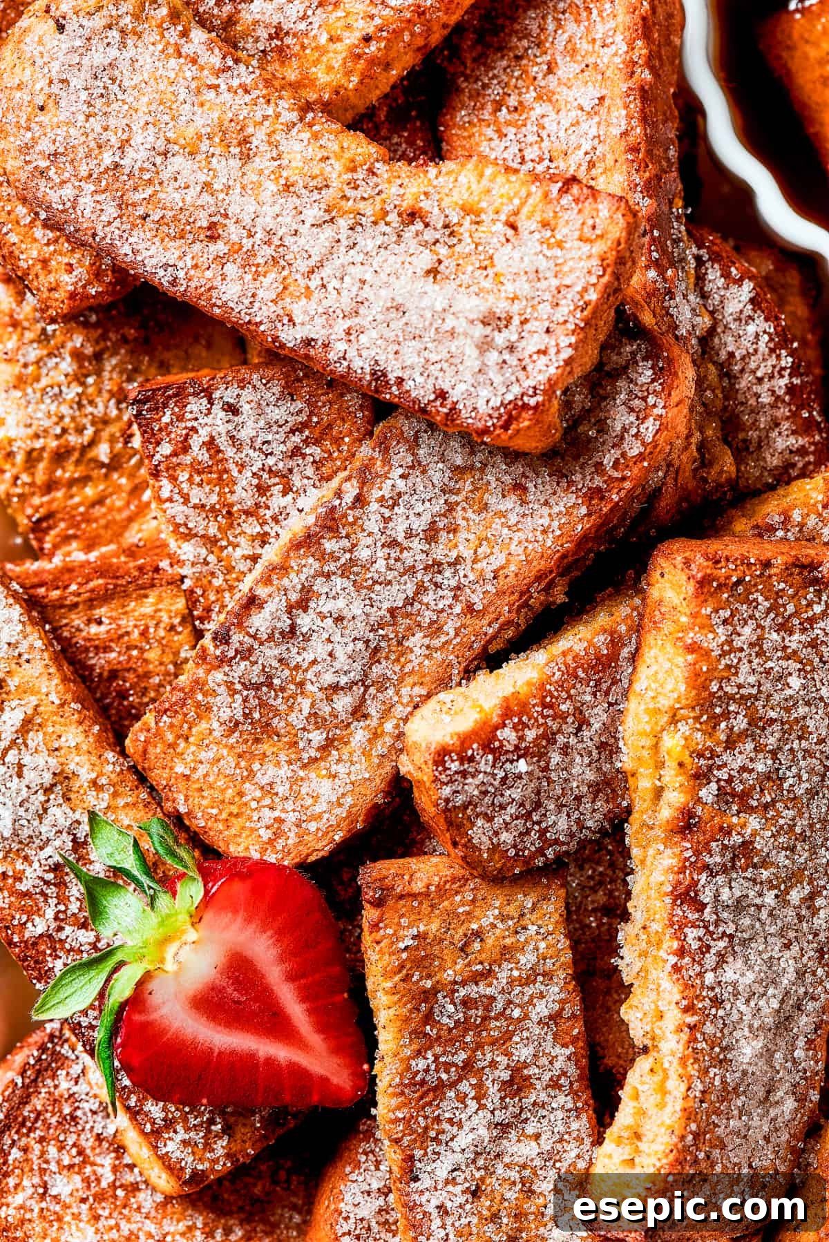 Close-up shot of cinnamon-sugar coated French toast.