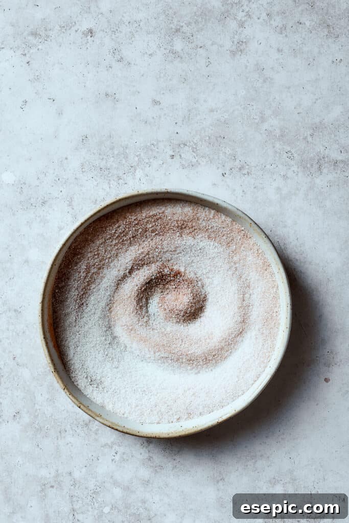 A bowl of cinnamon-sugar mixture.