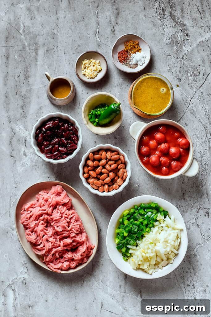 Turkey chili ingredients measured and arranged on a work surface.