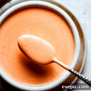 Homemade yum yum sauce in an earthenware bowl.