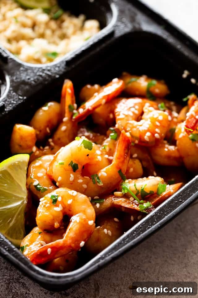 Sheet Pan Teriyaki Shrimp in a black container, ready for meal prep.