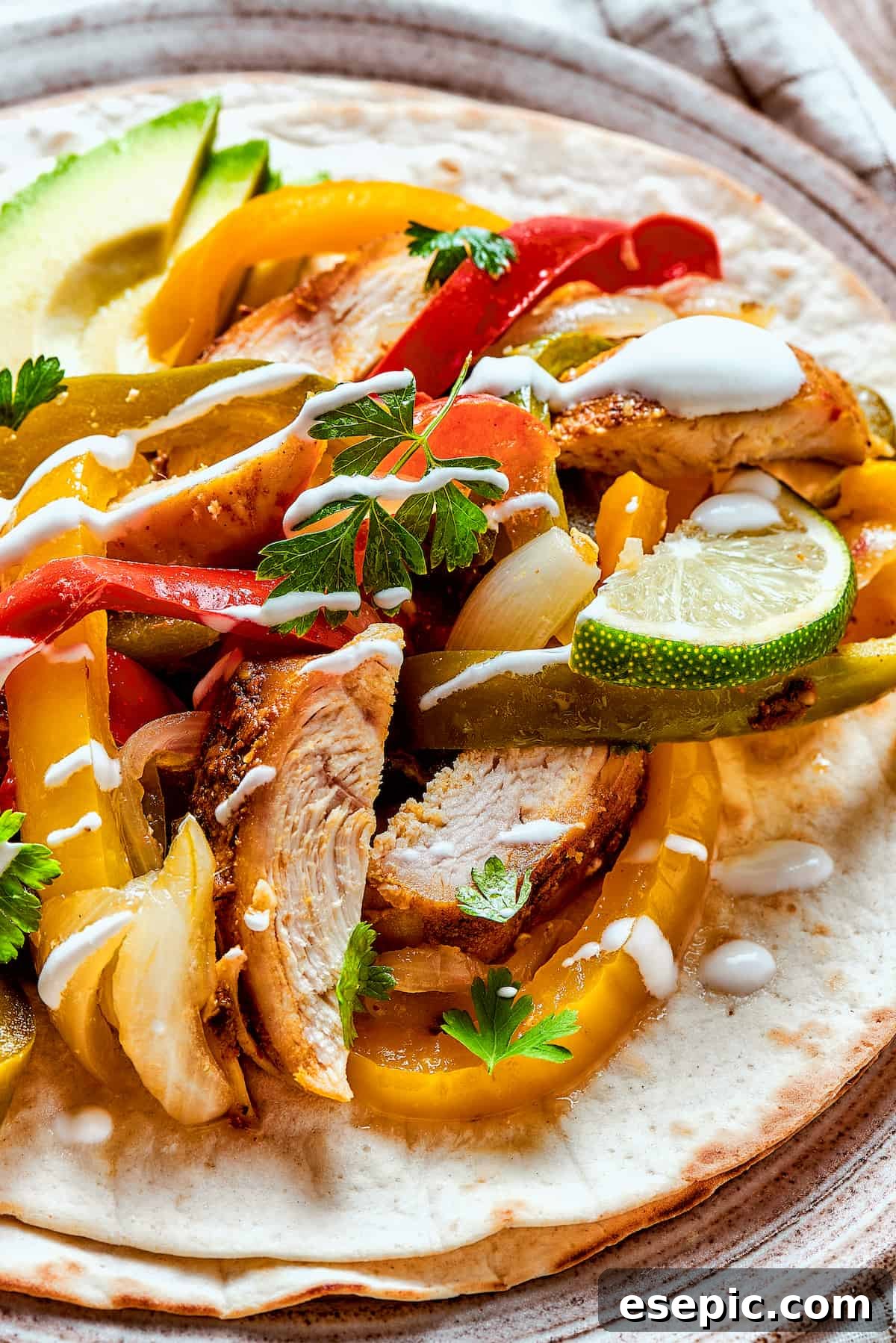 Slow cooker chicken fajitas with sour cream.