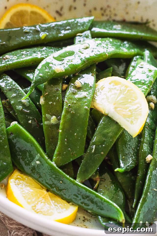 Close-up shot of blanched Romano Beans, showing their flat, wide shape.