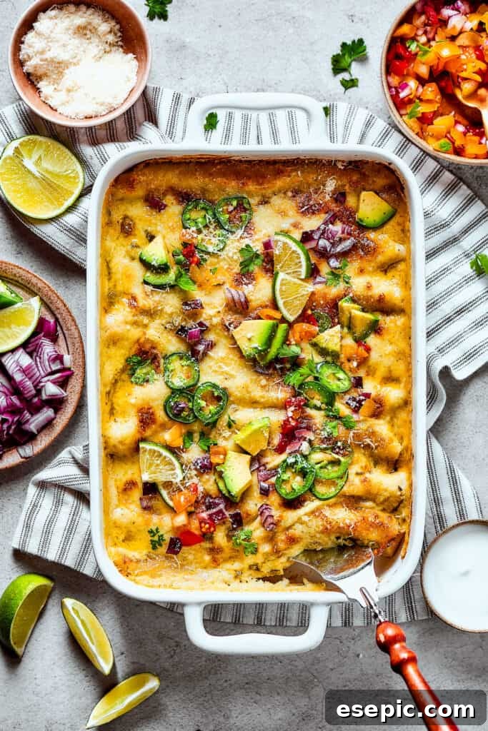 Baked shrimp enchiladas with toppings.