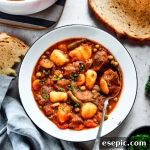 Overhead shot of beef stew with mixed vegetables.