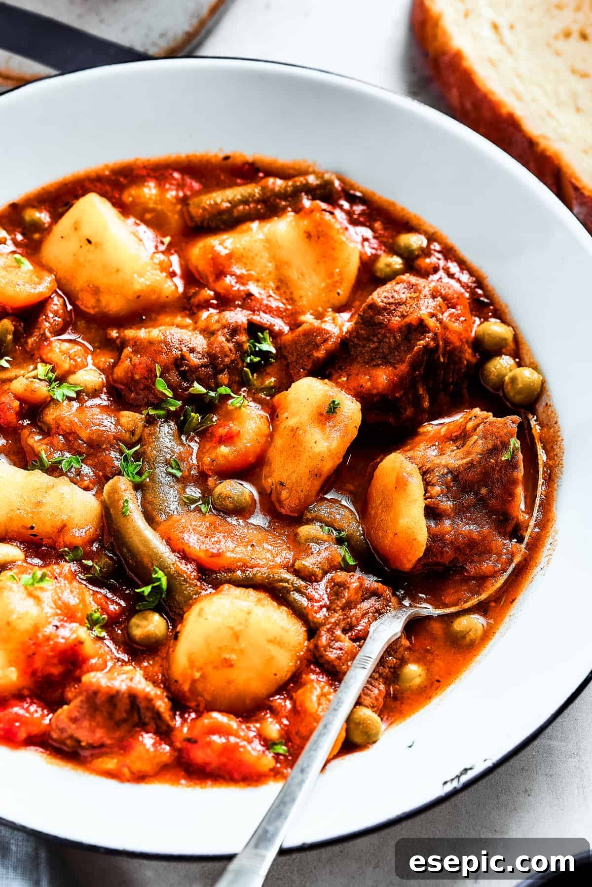 Classic Mulligan Stew with Hearty Beef and Fresh Vegetables A bowl of Mulligan stew featuring mixed vegetables and stew beef cubes.