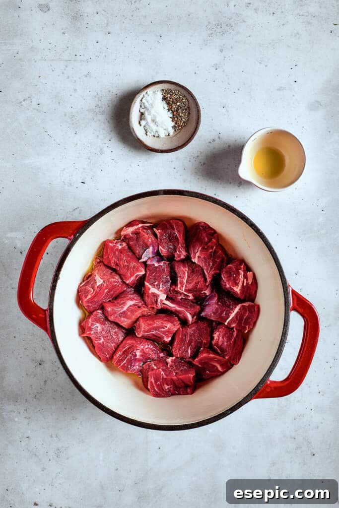 Searing Beef for Mulligan Stew Browning beef in a soup pot, forming a delicious crust.