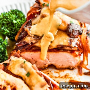 A thick stream of vivid yellow honey mustard sauce is added to a plate of Alice Springs chicken.