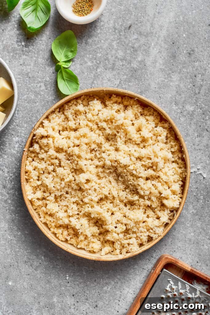 A small bowl holding the mixed Parmesan, Panko breadcrumbs, melted butter, and Italian seasoning, ready to be sprinkled.