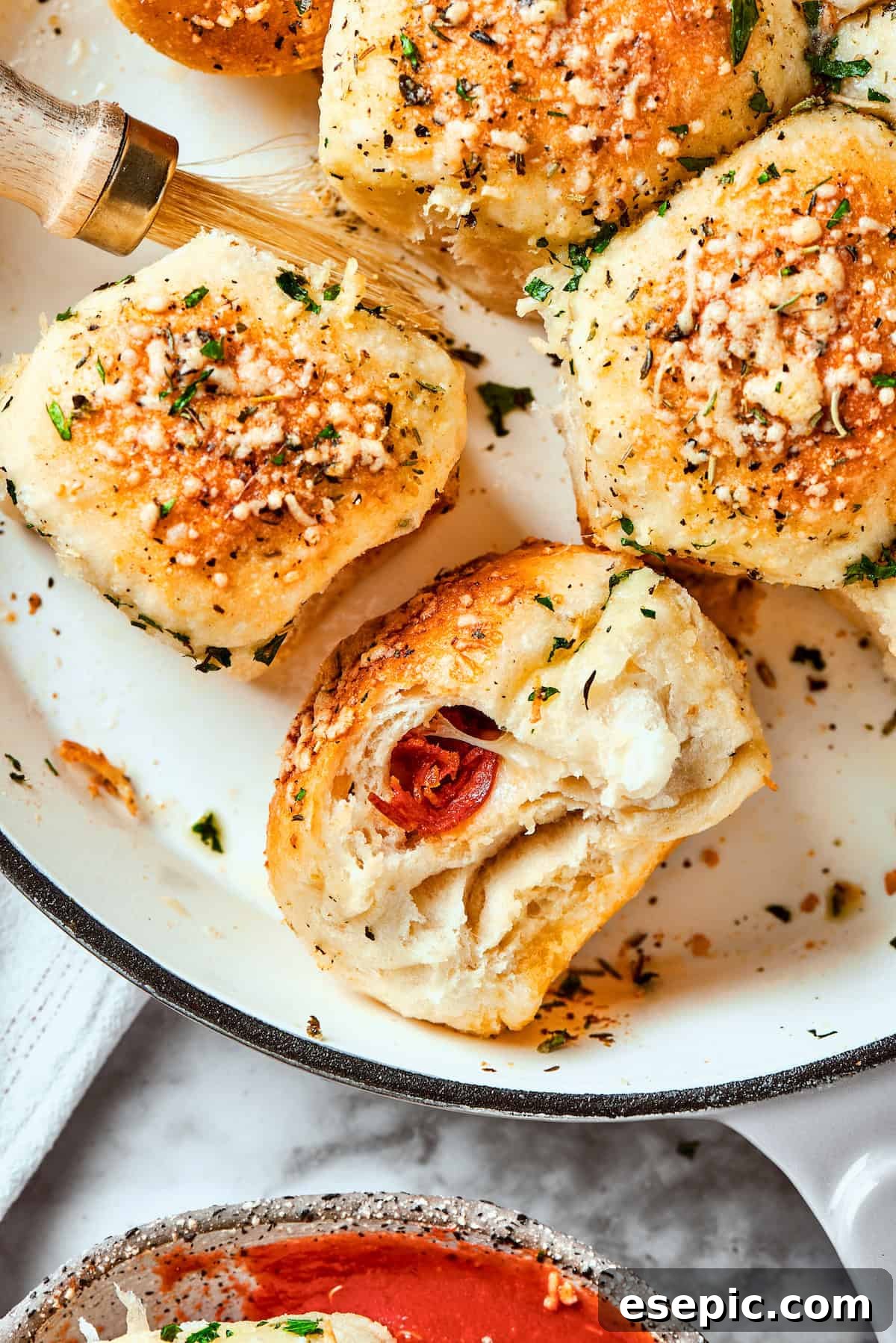 A few pizza bites are shown in a skillet.