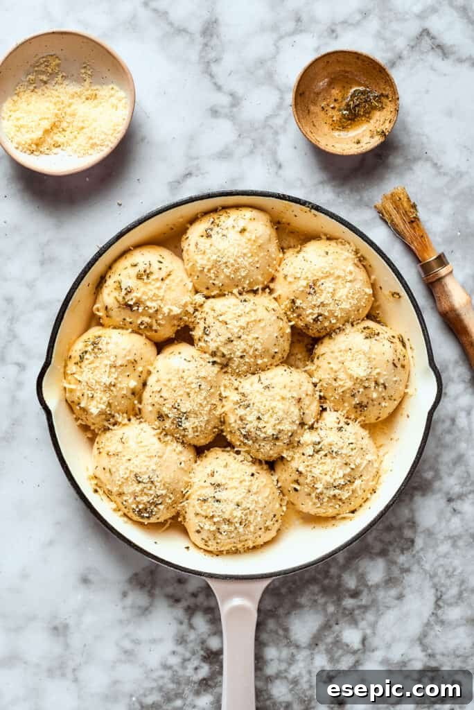 Pizza bites are ready to be baked in a skillet.