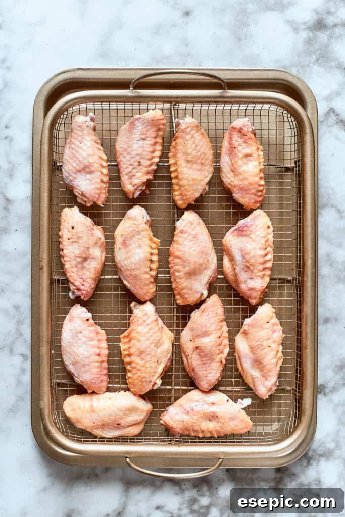 The wings are shown on a baking tray.