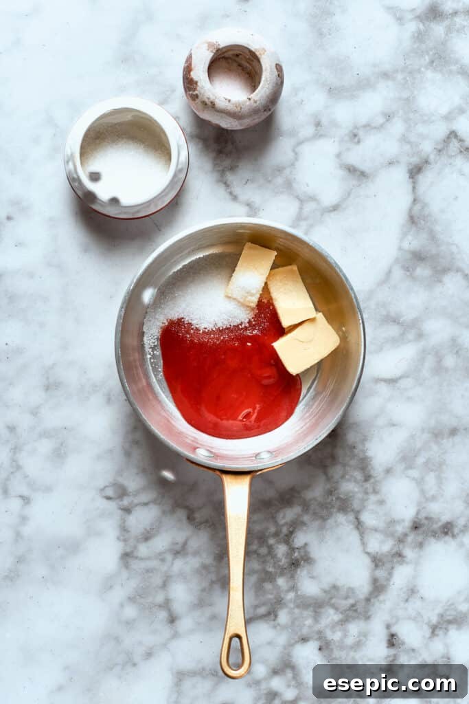 The sauce ingredients are added to a pot.