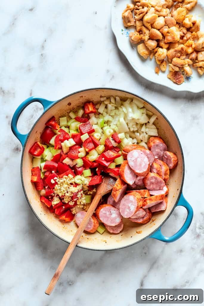 The rest of the jambalaya ingredients are added in.