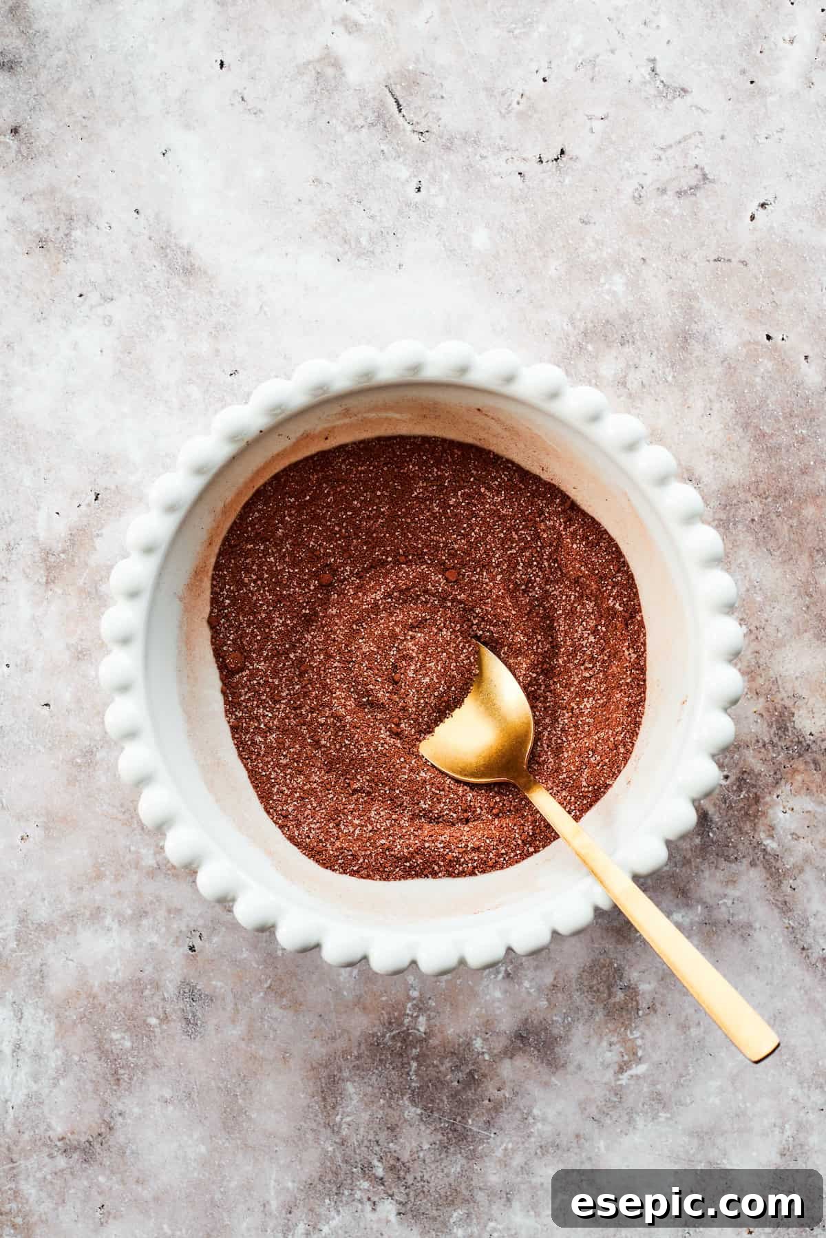 This moist and gooey Chocolate Pudding Cake is loaded with rich chocolate flavor in every bite. Best served warm! A spoon mixes the fudge topping.
