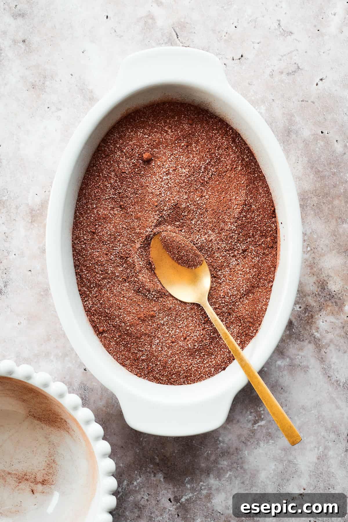 This moist and gooey Chocolate Pudding Cake is loaded with rich chocolate flavor in every bite. Best served warm! The topping is spread over the cake batter.
