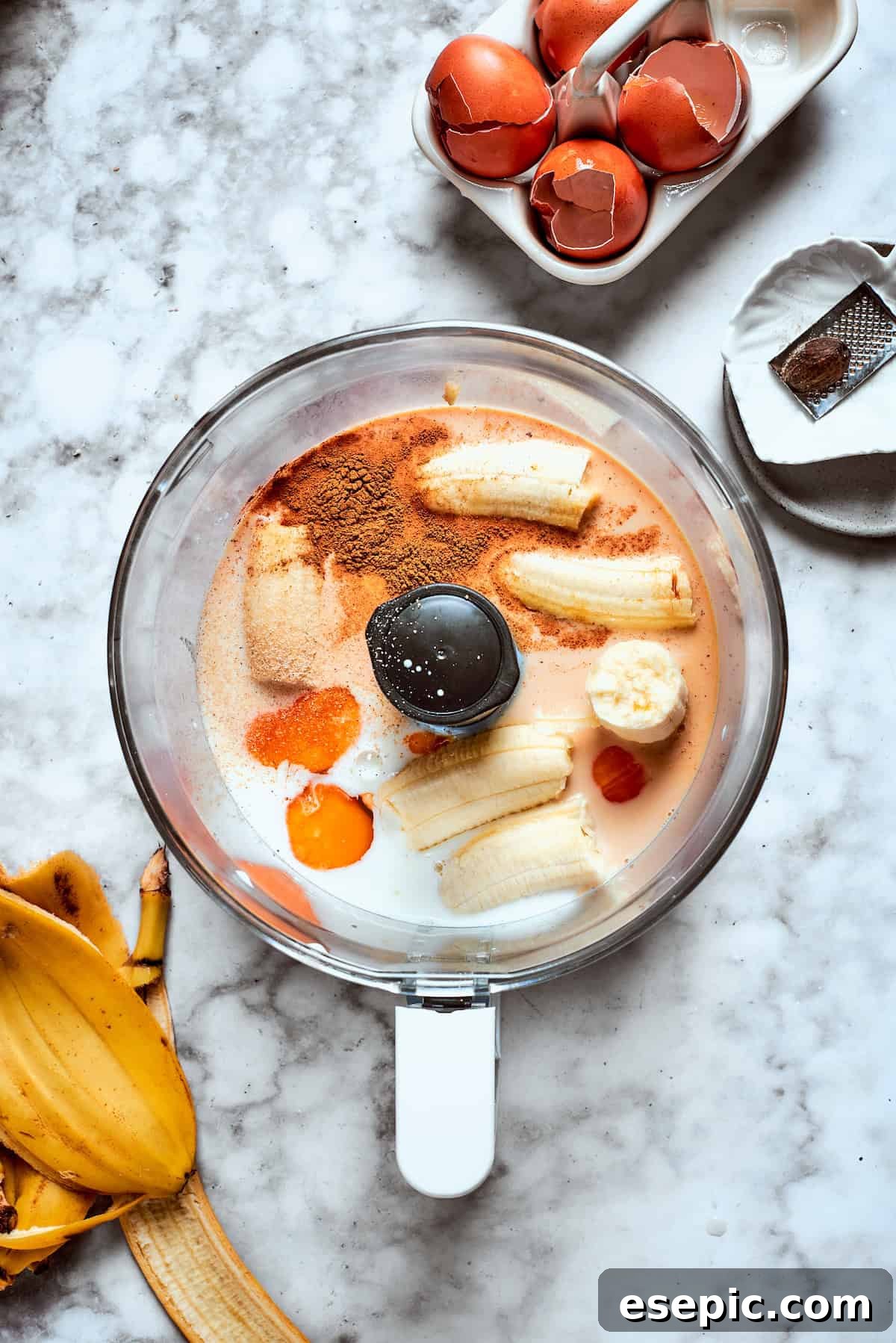 Bananas and rest of the batter ingredients are placed in a food processor.