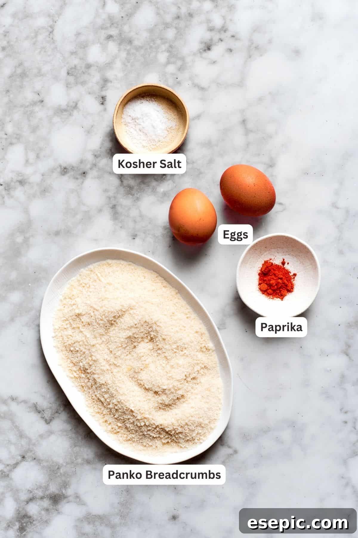 This easy homemade Chicken Nuggets Recipe features perfectly cooked homemade chicken nuggets that are crispy outside and juicy on the inside. Breading ingredients for chicken nuggets recipe: panko breadcrumbs, salt, eggs, paprika.