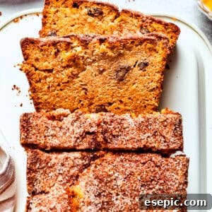 A loaf of Amish friendship bread with three slices cut from it.