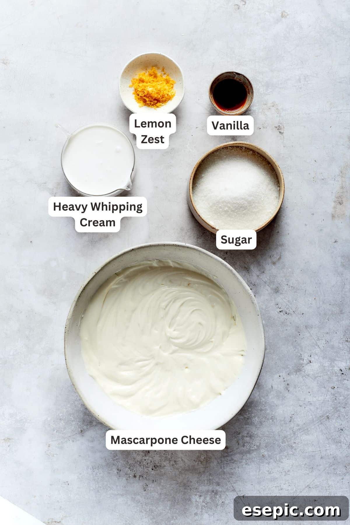 Lemon tiramisu filling ingredients: mascarpone cheese, granulated sugar, heavy cream, lemon zest, vanilla extract.