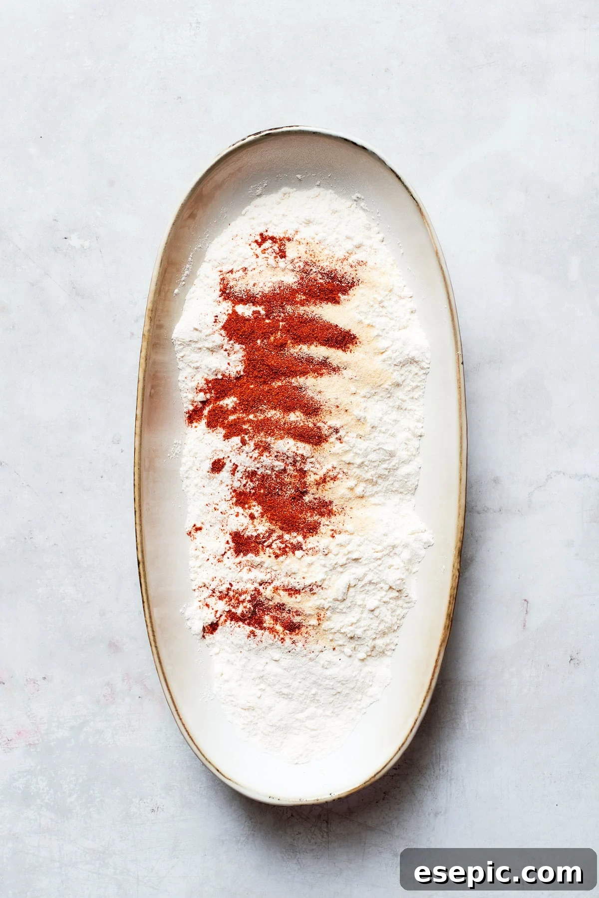Spices are added to the flour.