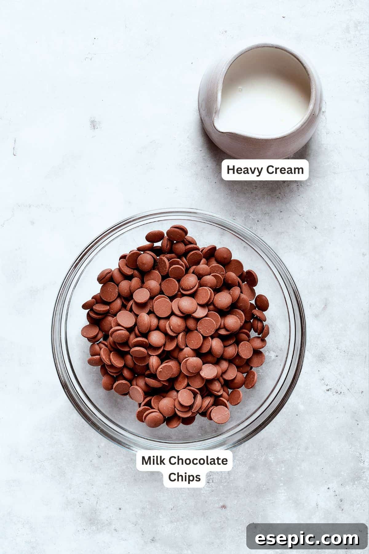 Millionaire Bars are decadent layers of homemade buttery shortbread, creamy caramel, and thick chocolate ganache. Labeled ingredients for the chocolate ganache layer: heavy cream, chocolate chips.