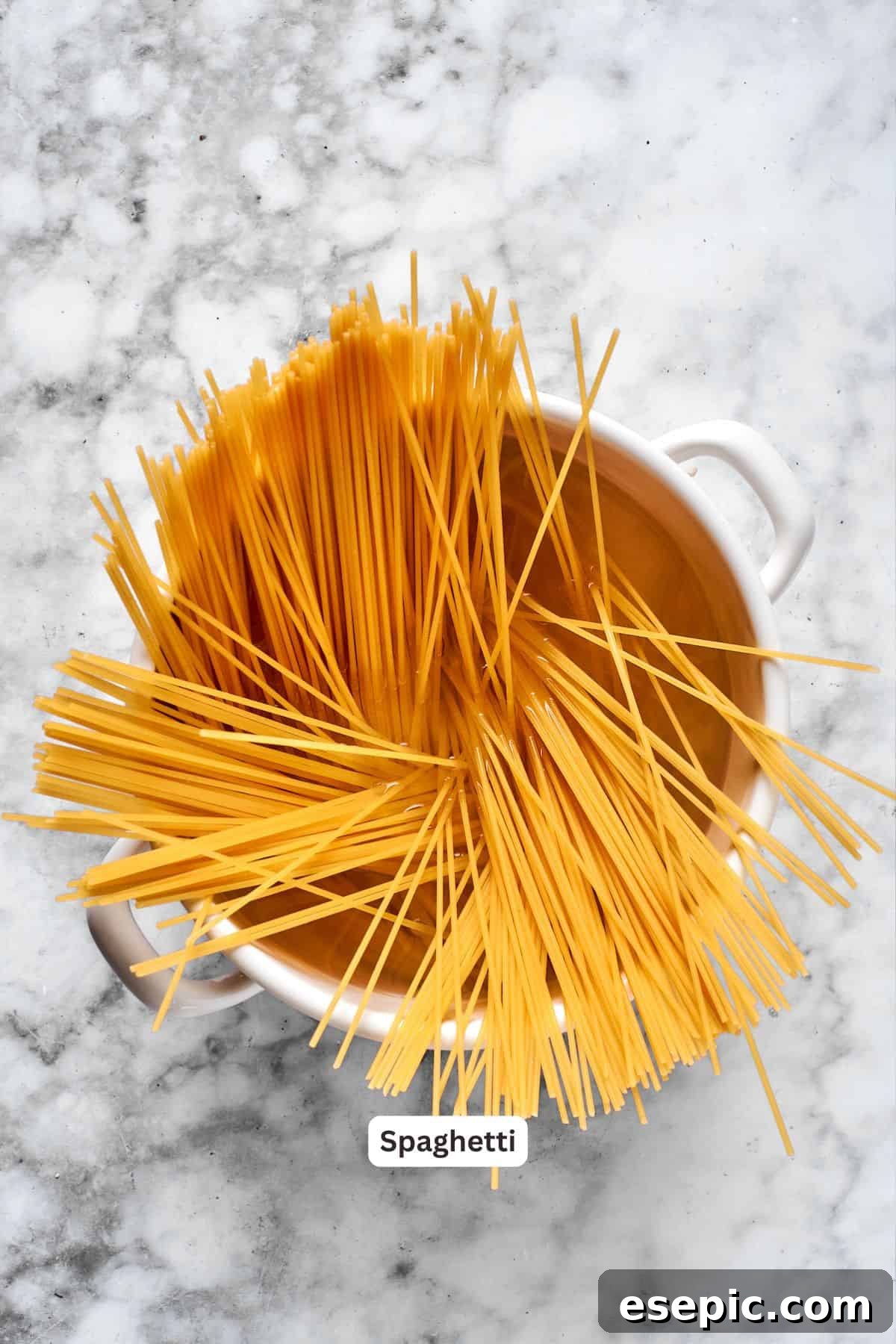 Spaghetti cooking in a pot of boiling water, ready for the million dollar spaghetti casserole.
