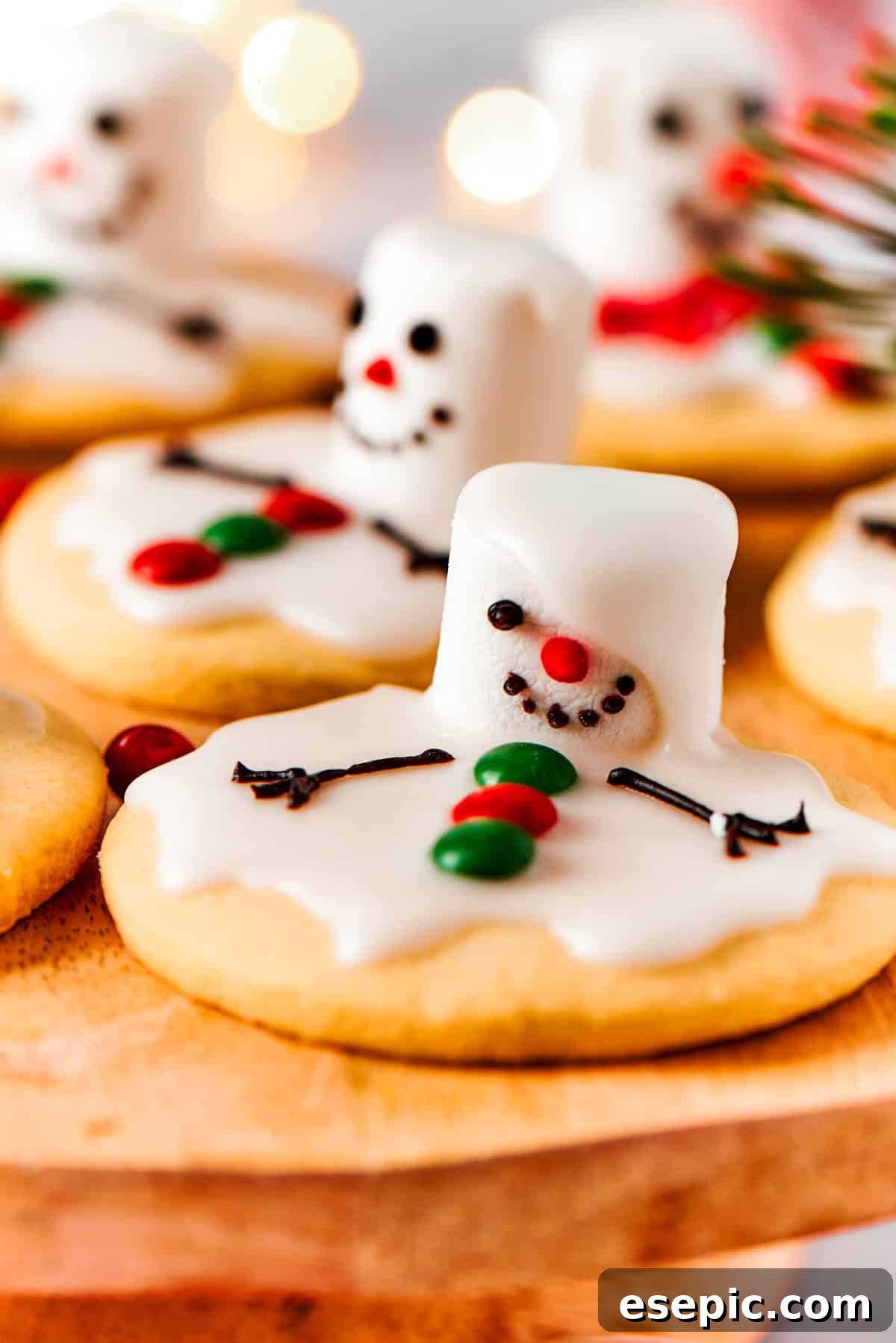 A charming close-up of a single melted snowman cookie, highlighting its delightful details and festive appeal.
