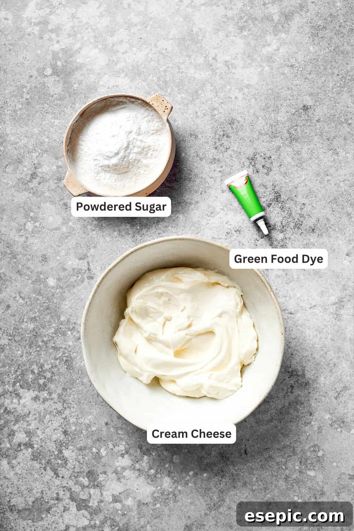 The frosting ingredients for grinch cake are labeled, including cream cheese, powdered sugar, and vanilla.